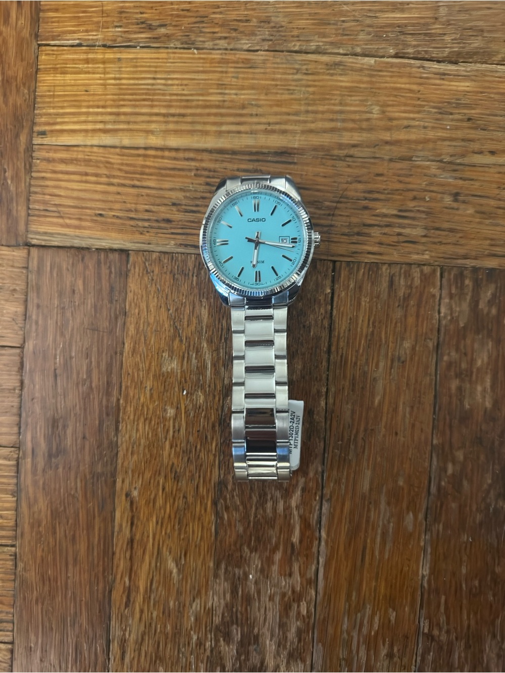 Casio Silver Bracelet Watch with Turquoise Dial